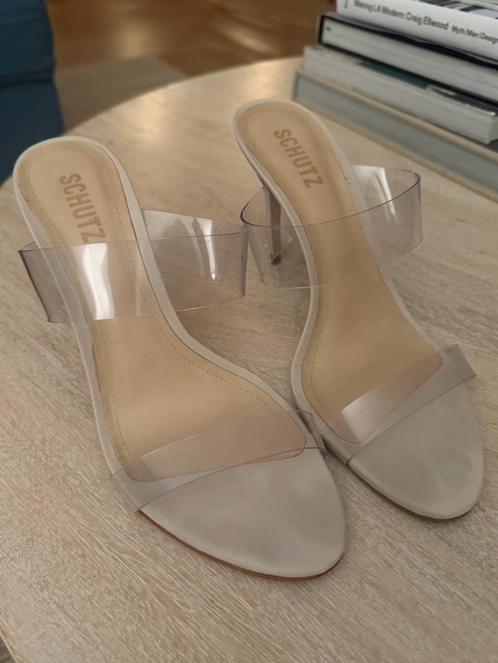 SCHUTZ Clear-Strap Slide Mules in Nude